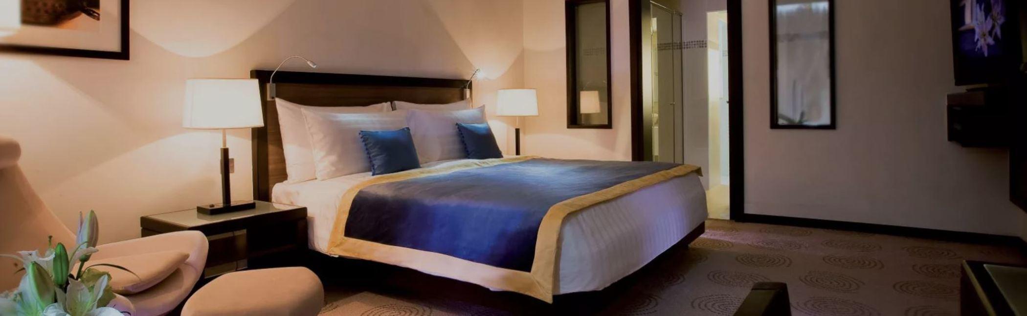 فندق أفاني ديرة دبي المظهر الخارجي الصورة A bed